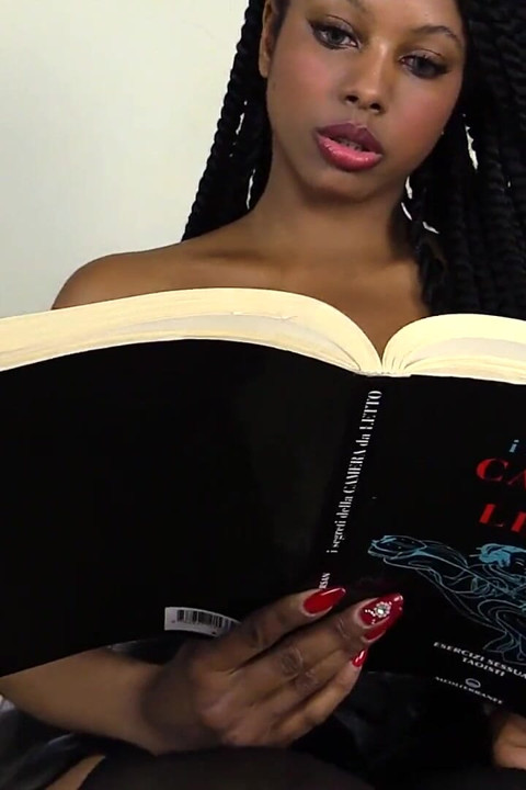 Janelle pissing on a dildo