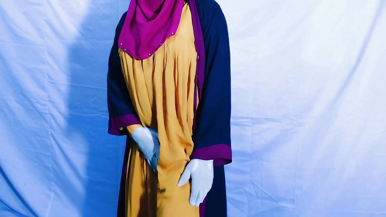 A very beautiful Indian woman wearing a hijab is spending the night with a man who is not her husband.