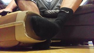 Vacuuming black Nike socks