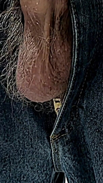 Captivating moment from "Semi Hard Cock Hanging out of Jeans"
