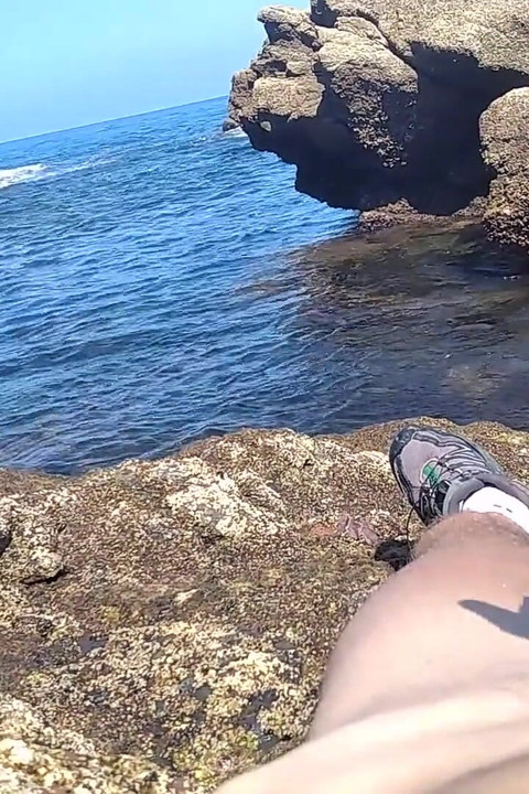 Jerking off a Big Hard Dick Overlooking the Sea in the Beach Cove Until He Cums