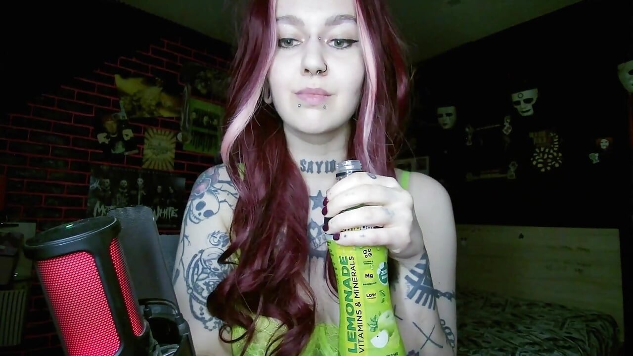 Sexy Alternative Redhead Drinking Soda and Burping