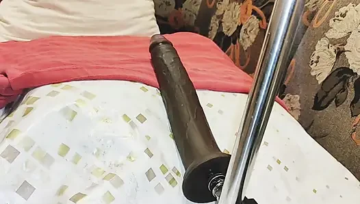 Fucking machine with BBC dildo