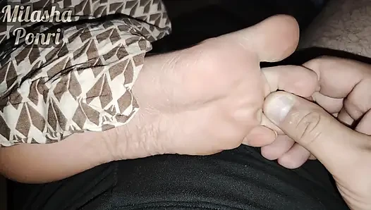 Stepsister's feet get a light massage while watching a movie