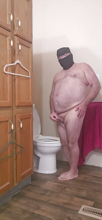 Nasty completely nude exhibitionist in the bathroom.