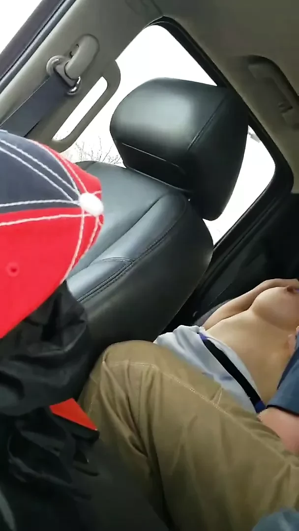 Husband films wife and friend in back seat