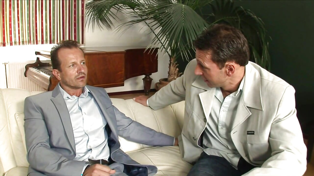 Blonde slut in fishnets having hot sex on the couch