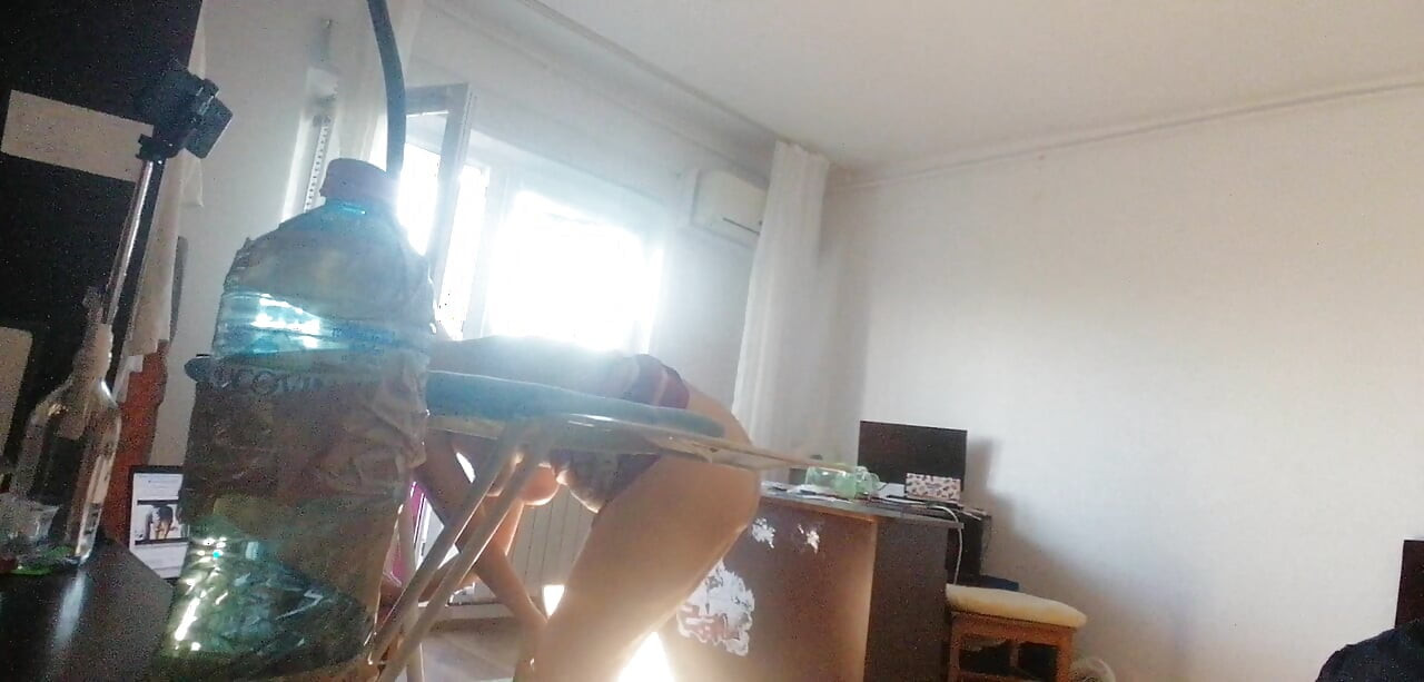 Amateur wife doing housework naked. Sexy and naughty wife trying on the clothes she cuts.