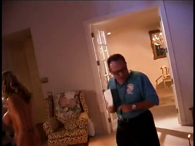 Behind the scenes footage of a camera crew filming a porn movie