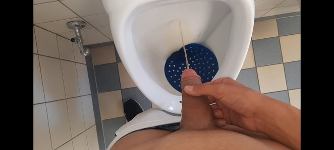 Young Student is pissing in his public school toilet