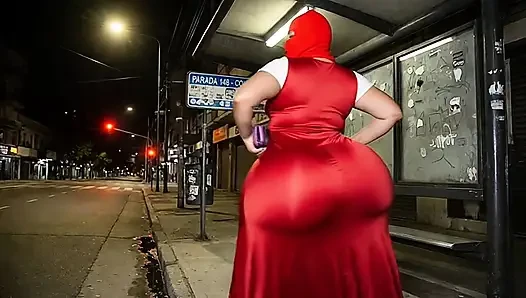 Latina mit dickem rotem partykleid wartet auf den bus
