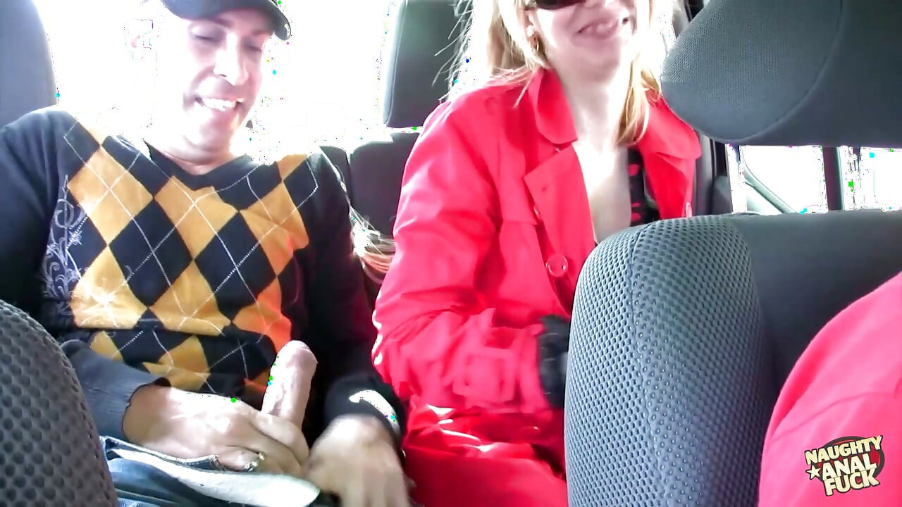 A blonde engages in oral sex in a vehicle and thereafter has anal intercourse outside.