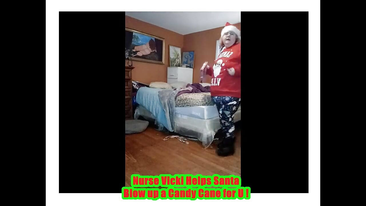 Nurse Vicki Blows up Huge Candy Cany for Santa!