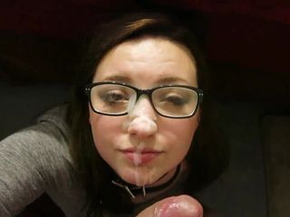 Geek girl in glasses taking facial