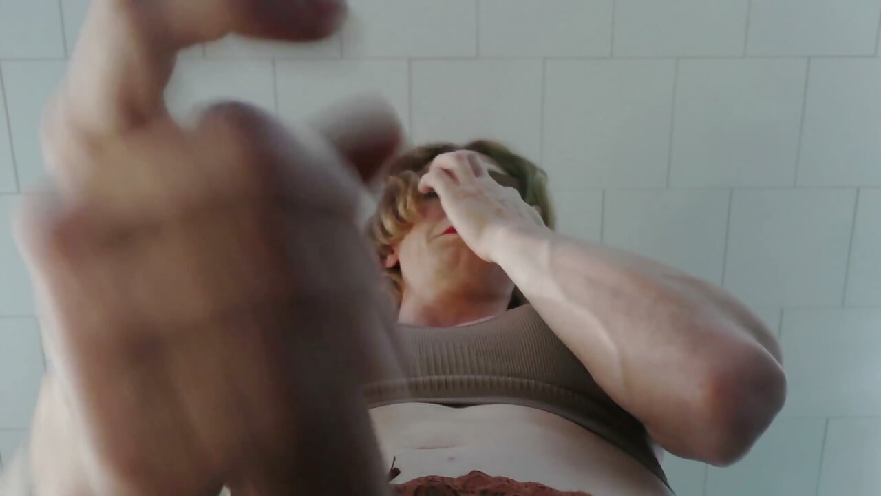 strawberry blonde femboy red lipstick tease - sports bra & fishnets cums on your face