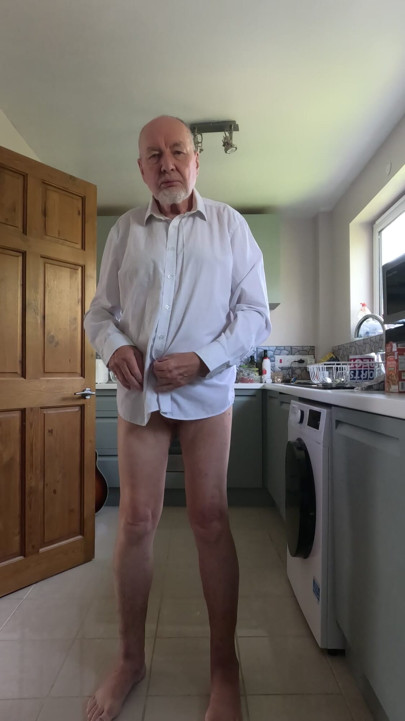 Stripping naked in the kitchen