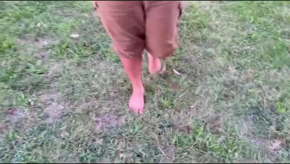 Ebony Foot Goddess Walking on Grass