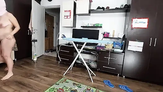 Sexy Brunette Doing Naked Chores Around the House.