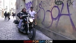 Hot looking biker is seduced by a gay