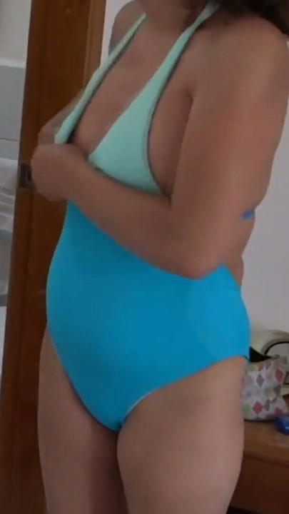 58-year-old Latina milf at the beach shows off in bikini | Clip 2