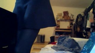 hacked laptop camera. girl puts on pantyhose