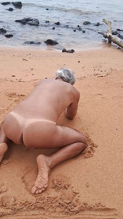 Ladysilva on the beach naked showing off her big sexy ass tanned with mark