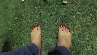 long red toes on grass