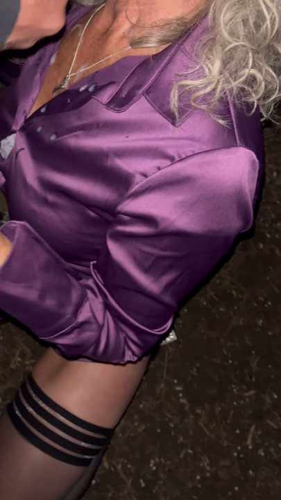 Taking a nice load of cum over her satin blouse