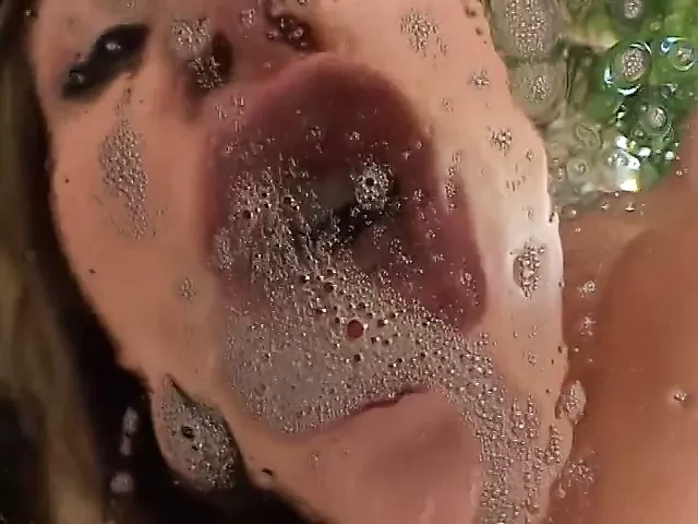 Two eager young brunettes get fucked by four horny studs in the living room