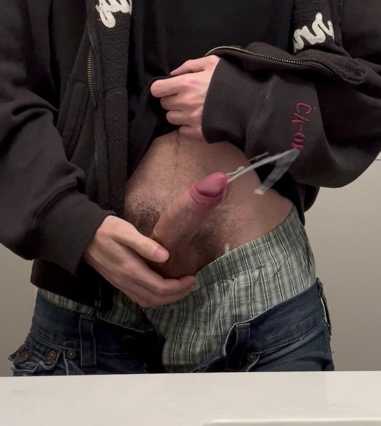 College stud shoots long cumshot in school bathroom