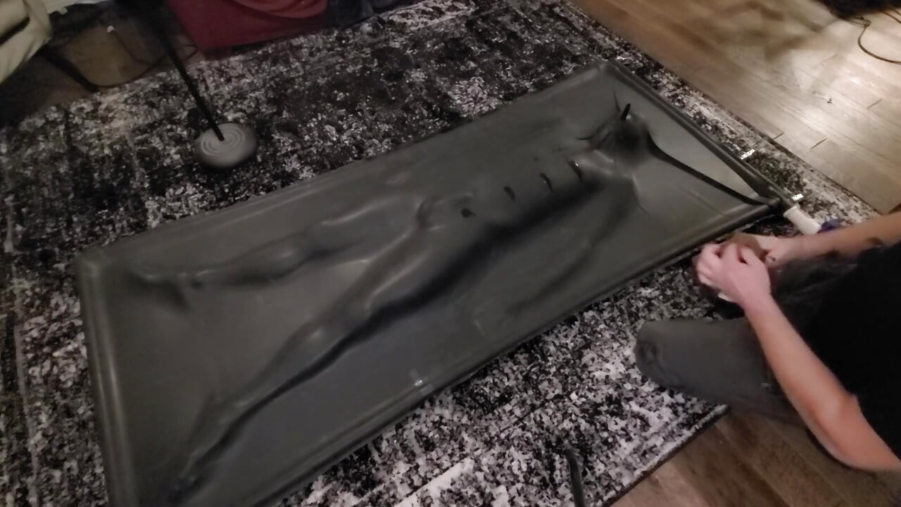 Cute twink tormented in latex vacbed
