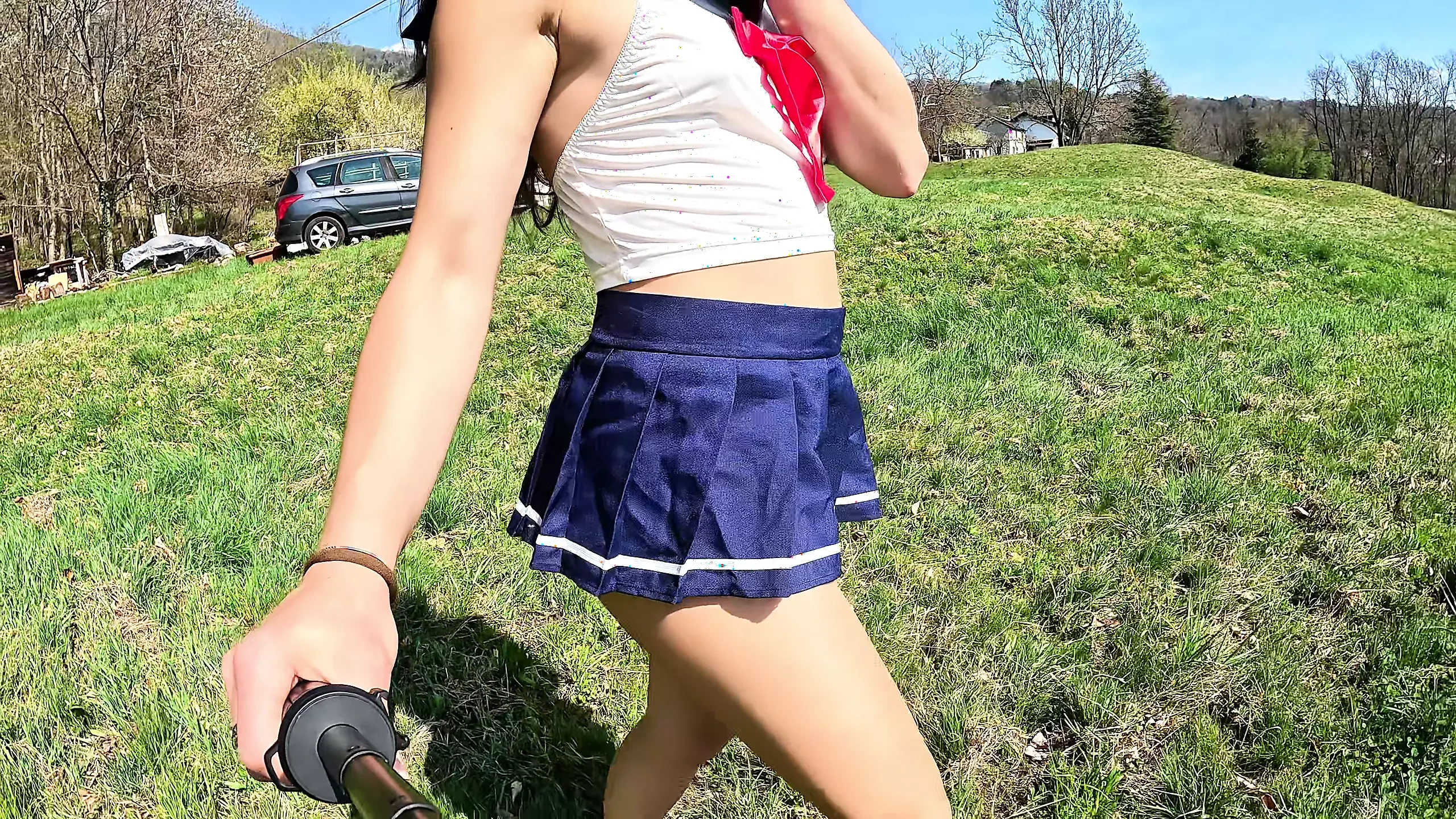 I am discovered by a gardener while walking in the countryside in my schoolgirl dress!