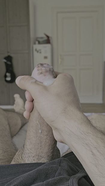 close up cum shot of my big uncut cock thick cum big cumshot large uncut cock on bed playing with my hard dick had a great time and fantastic cumshot