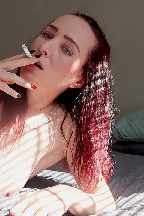 Nude Smoking on the Bed