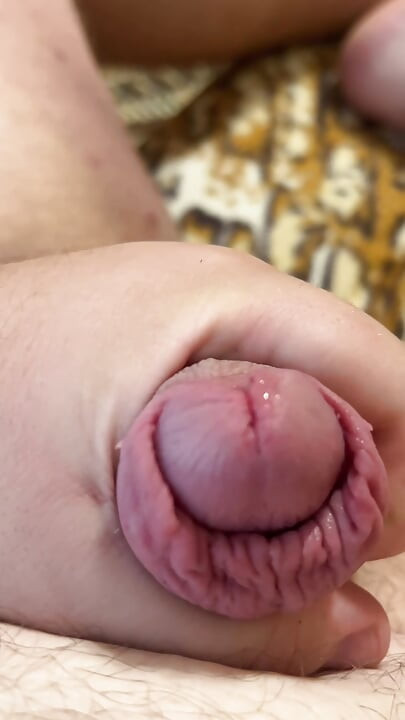 Fat man lying on the couch shows his ass and cums without hands, a lot of cum, cum, uncircumcised penis