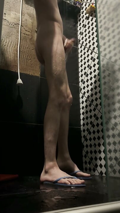 Skinny Twink Playing with a Toy at the Shower