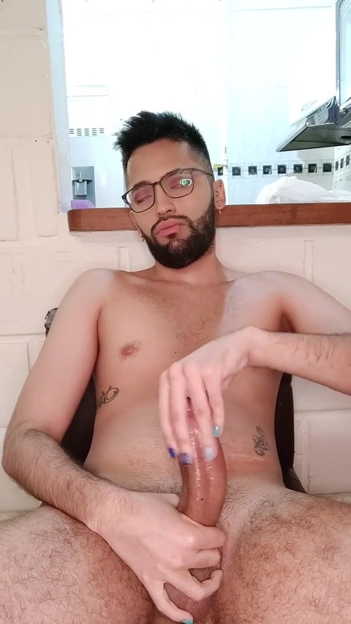 Jerking my big uncut cock with lube until I cum