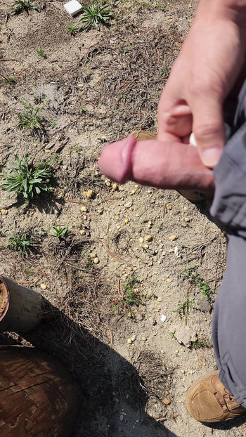 Iconic moment from "Hot hard thick ringed clamped mushroom tipped cock throbbing outdoor pissing"