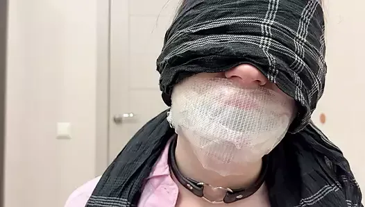 Tape tied to chair, ball gagged