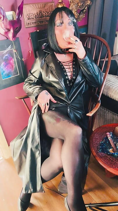 Your Favourite Smoking Queen Dressed In A Full Length Leather Coat, Pantyhose & High Heels Smokes A Cork 100 Cigarette For You