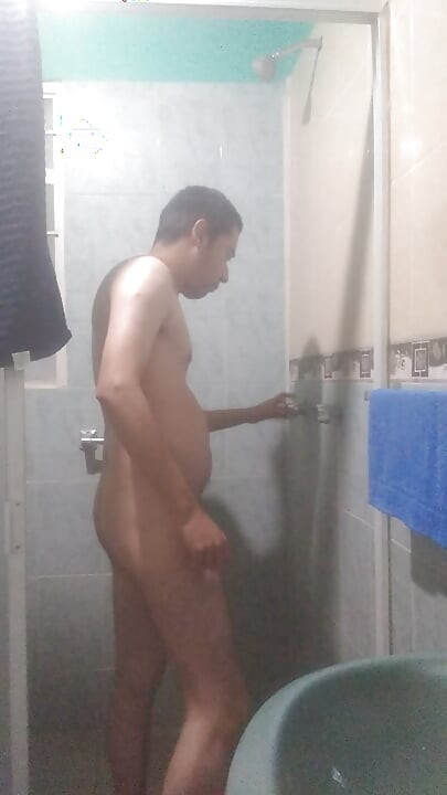 Man has fun before shower
