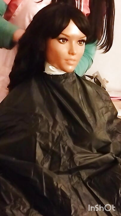 Ebony sex doll Nikki wears barberette capes