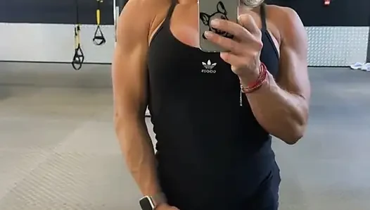 Female bodybuilder practising her poses