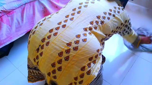 Indian Muslim Bhabhi gets stuck under the bed while cleaning the house then the neighbor helps her by fucking her in the ass
