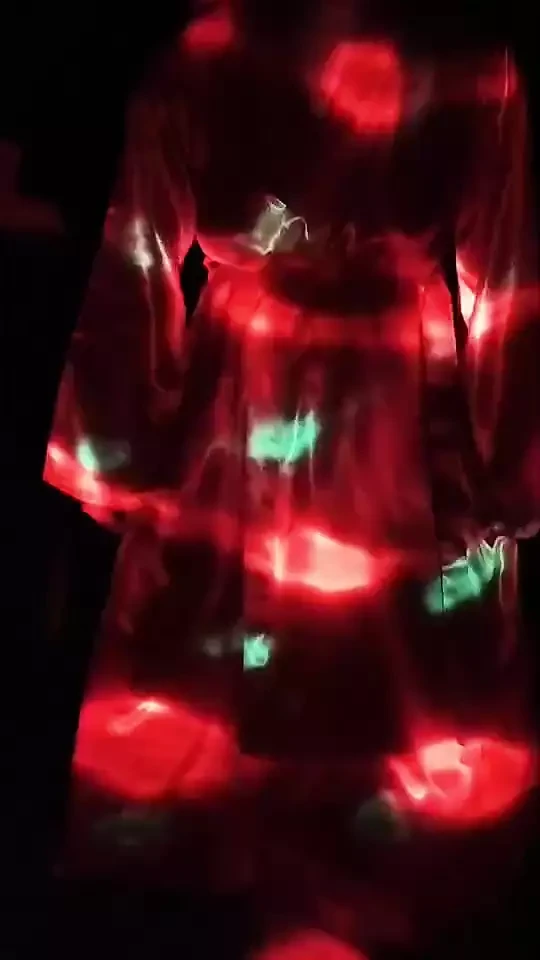 Gliding through red pajamas.