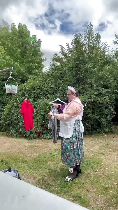 In vintage maid outfit for a day