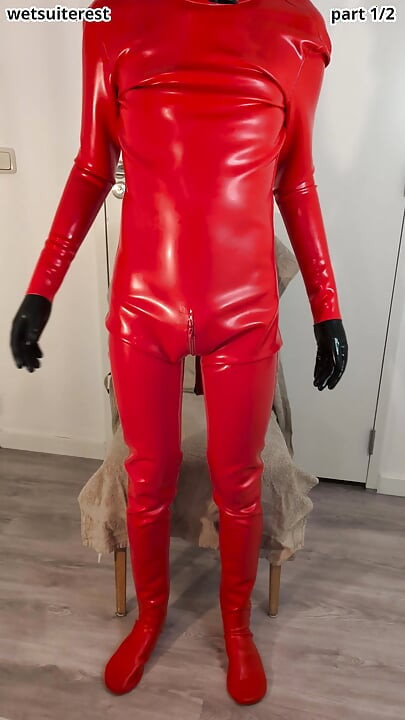 Putting on heavy rubber hazmat suit 1mm thick latex with gasmask