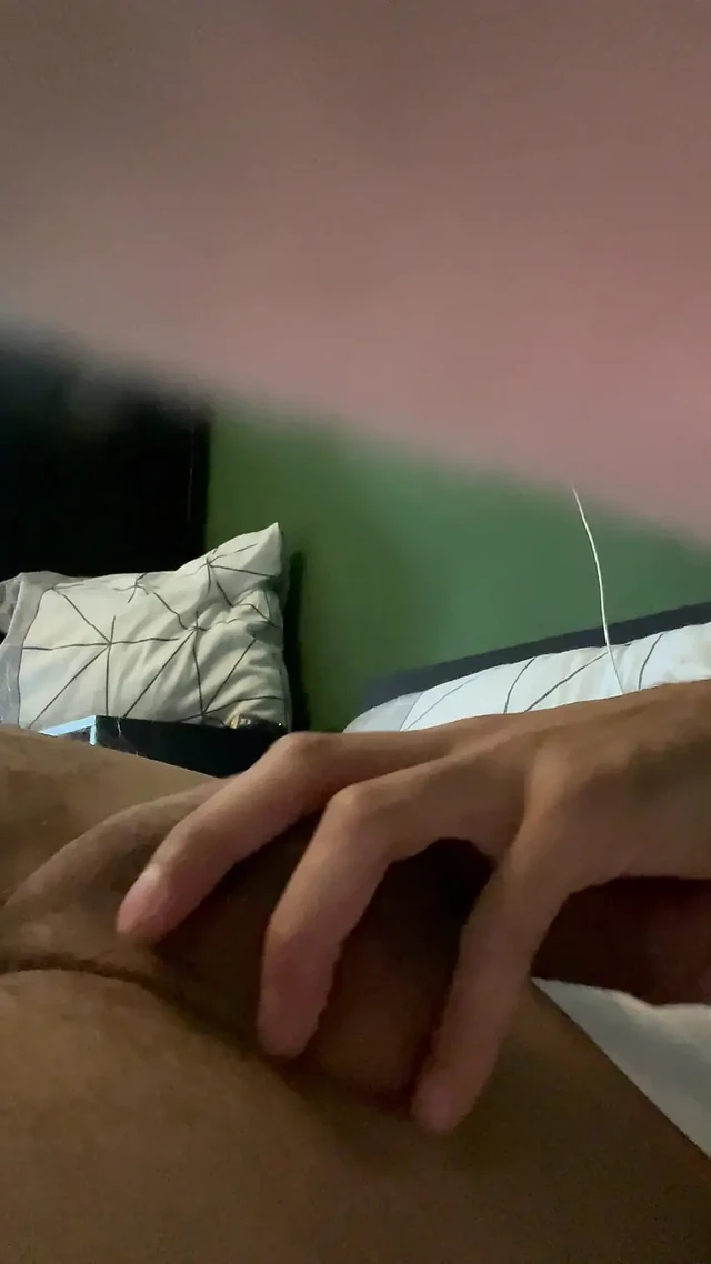 Me jerking my self off on the bed and cumshot for you showing my shaved Dick.