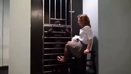 Lady warden disciplines prisoner in her private torture cell