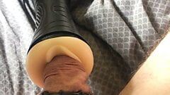 Isaac Hunt squeezes his huge white cock into tight fleshlight and cum explodes at the end.